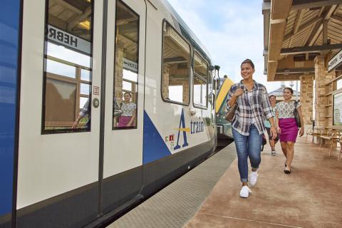 Students walking onto A-train