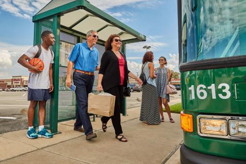 Passengers boarding a DCTA bus