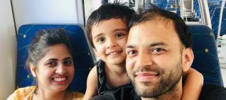 Hitesh and Family posing on train